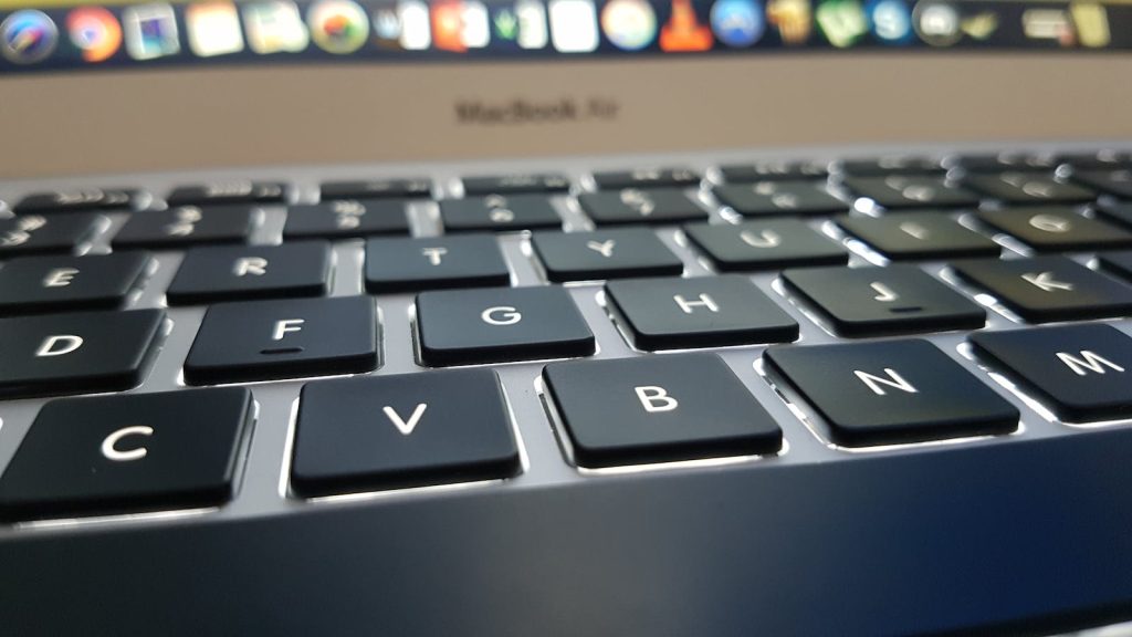 Selective Focus Photography of Turned-on Macbook Air